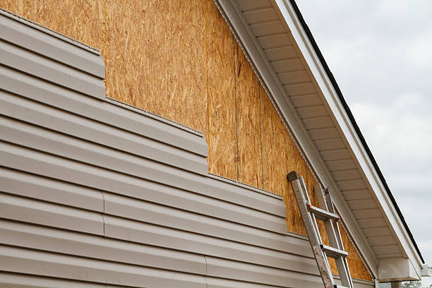Professional Siding technician working in Denver, PA